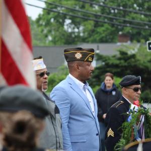 Veterans in a communal moment of silence,