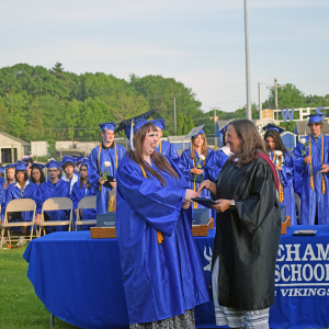 Abigal Balano was quite excited to receive her diploma from Lisa Ohman. 