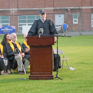 Matthew D'Andrea advises the students on how to be happy. 
