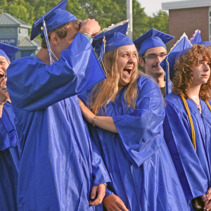 Students spot their loved ones in the crowd. 
