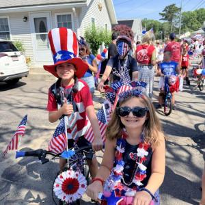 Residents ride through Swifts Beach for the annual Swifts Beach Improvement Association Fourth of July parade. Source: Christy Patalano