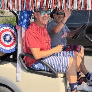 Kevin Legault and Joe Legault rode in a decorated golf cart in the parade. 