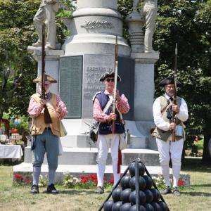 Mack Phinney, Howie Smith and Gary Franklin were part of the militia that fired a volley at the Antique Faire. 
