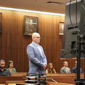Selectman Jared Chadwick stands in the courtroom on Thursday, July 9. Photos by Nick Mossman