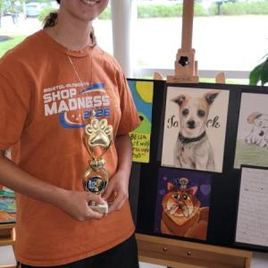 Ava Ostiguy with her winning Yorkie drawing.