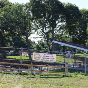 Barriers at the Onset Bandshell at 8:45 a.m. on Wednesday, Aug. 5, which are expected to be taken town later in the day. Photo by Nick Mossman