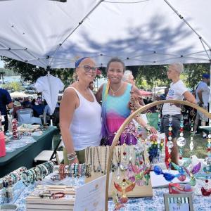 Joni Paulo and her daughter, Jasmine, at their stand. Photo by Christian Uva