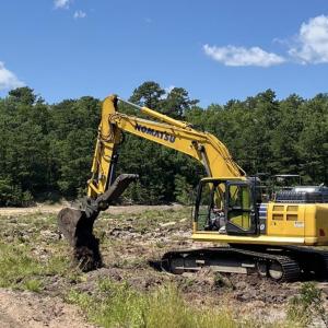Excavators dig up and mix the soil. Photo by Christian Uva