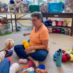 Donna Fox-Rubin categorizes and prices yarns. Photos by Sue Jackson