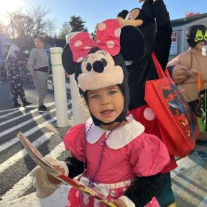 Stella Smith, 1, holds her new coloring book from Cumberland Farms during the trick or treat event on Friday, Oct. 30. Photos by Grace Roche