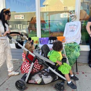 Trick or treaters stroll down Main Street. 