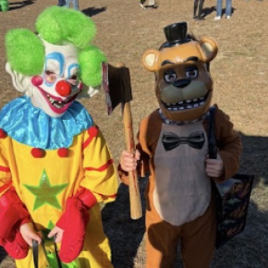 A clown and Teddy from Five Nights at Freddy's.
