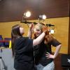 Abigail Balano, left, puts a wig on Lilyan Medina, who plays Cady Heron. Photos by Nick Mossman