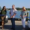From left to right: Thandi Nyambose, John Faherty and Sarah Corbitt cut the ribbon on the Circuit shuttle. Photos by Nick Mossman