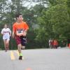 Noah Brilliant of Plymouth approaches the finish line in the 2017 Lazy Lobster Road Race. Photo by Matthew Bernat