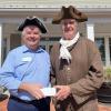 Howard Smith of the Minutemen and Militia accepts a grant from Glen Sherman of Cape Cod 5 to support the recognition day event. Photo by Tanvi Kulkarni