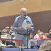 Howard Smith speaks against the petition to change zoning bylaws at the Oct. 26 Town Meeting. Photo by Tanvi Kulkarni