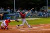 Returner Caden McDonald hits a ball to left field.